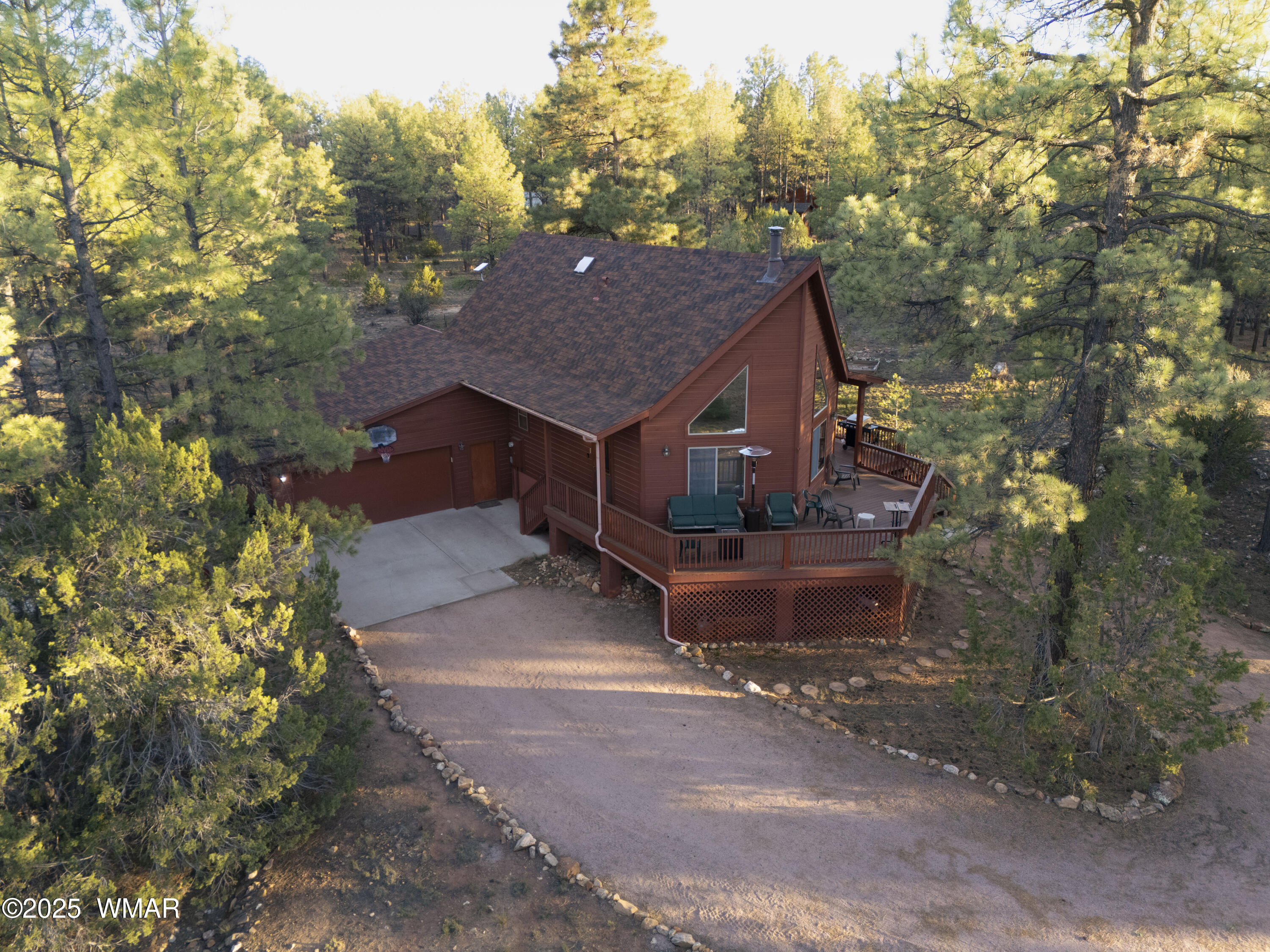 2975 Homestead Drive Overgaard, AZ 85933 - Photo 2 of 12 a view of a house with a yard