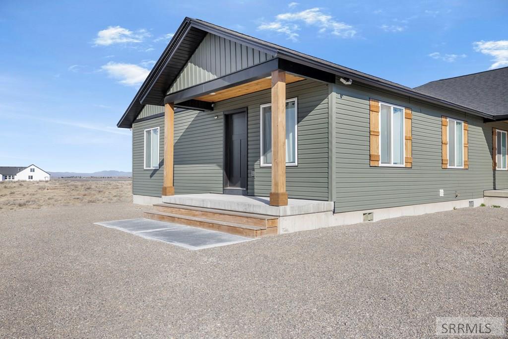 587 Springbrook Lane St. Anthony, ID 83445 - Photo 27 of 43 ADU Exterior entrance