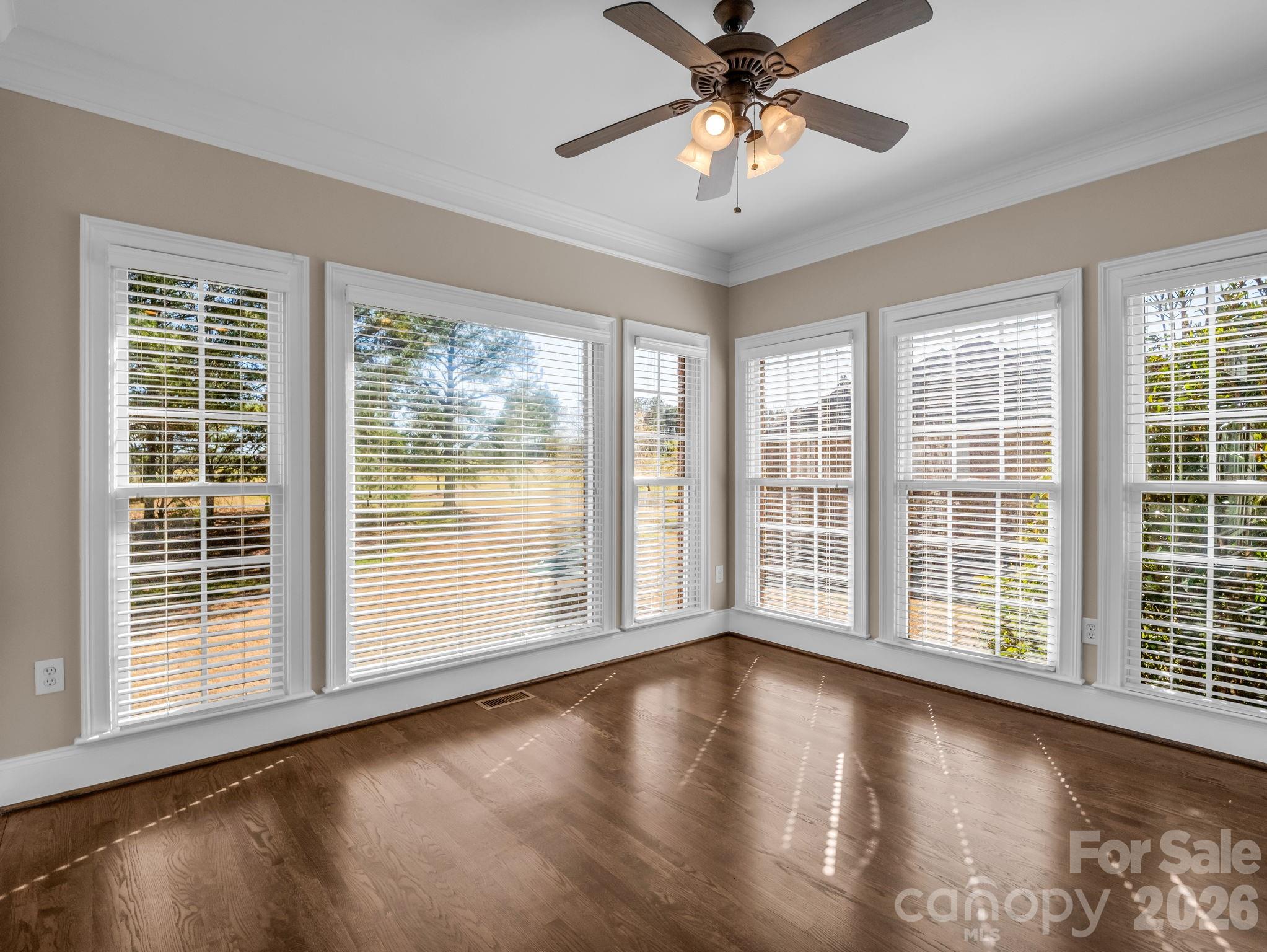 139 North Woodfin Ridge Drive Inman, SC 29349 - Photo 14 of 48 a view of an empty room with a window and wooden floor