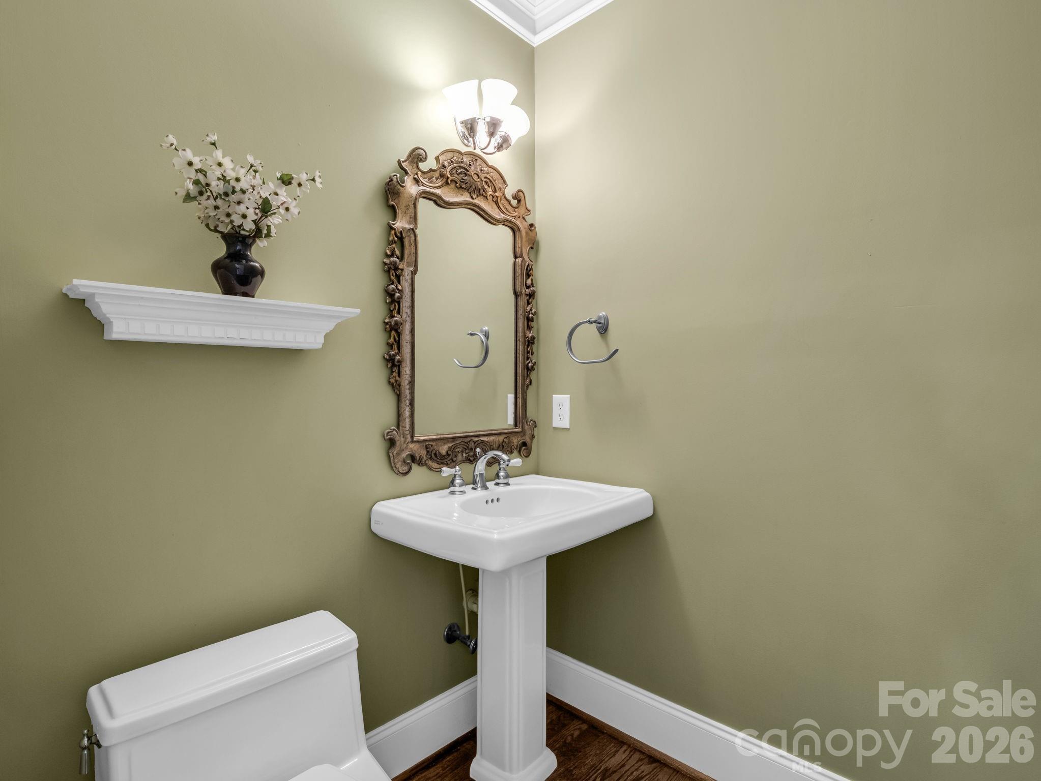139 North Woodfin Ridge Drive Inman, SC 29349 - Photo 16 of 48 a bathroom with a sink a toilet and mirror