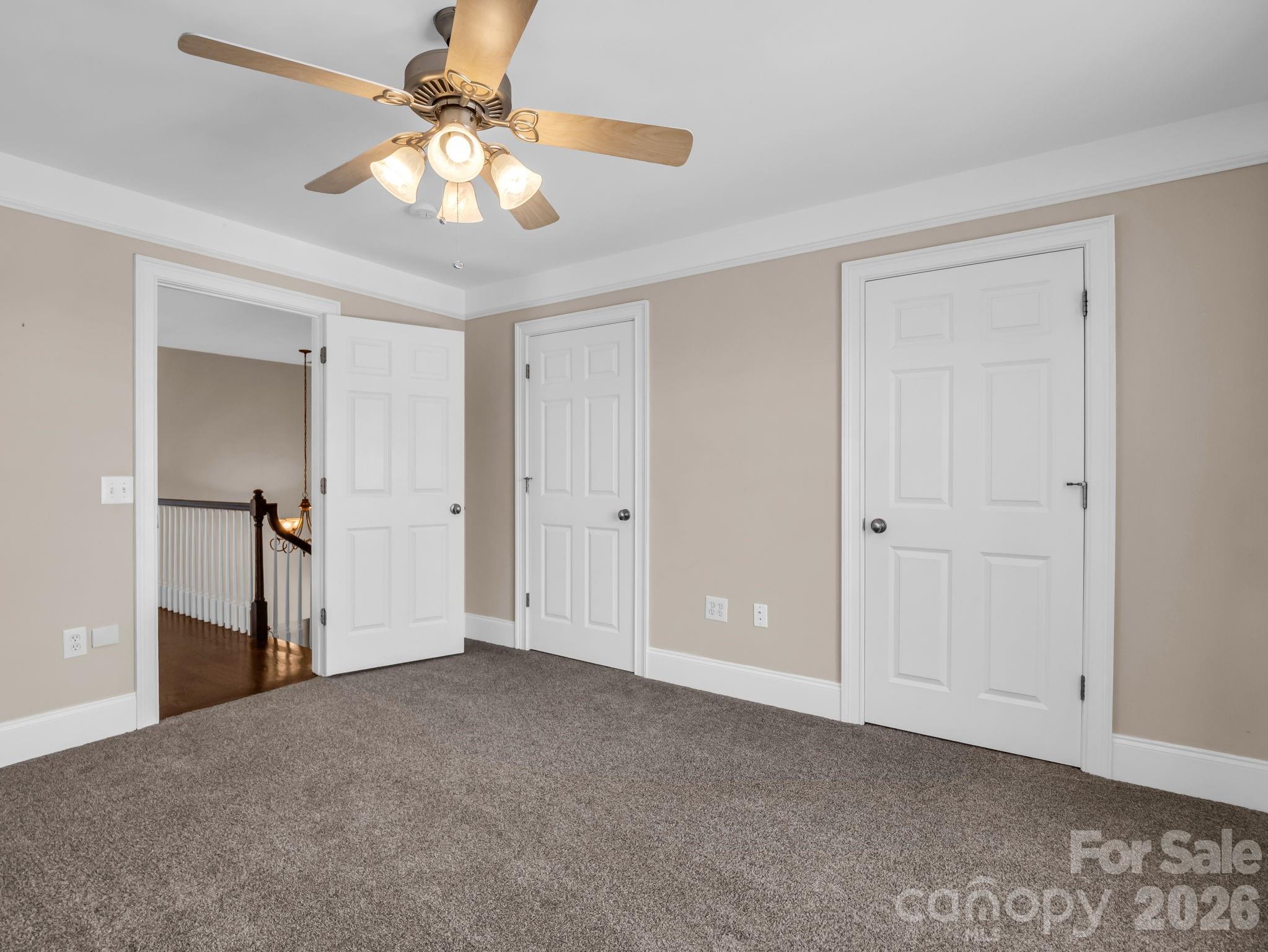 139 North Woodfin Ridge Drive Inman, SC 29349 - Photo 25 of 48 a view of an empty room and chandelier fan