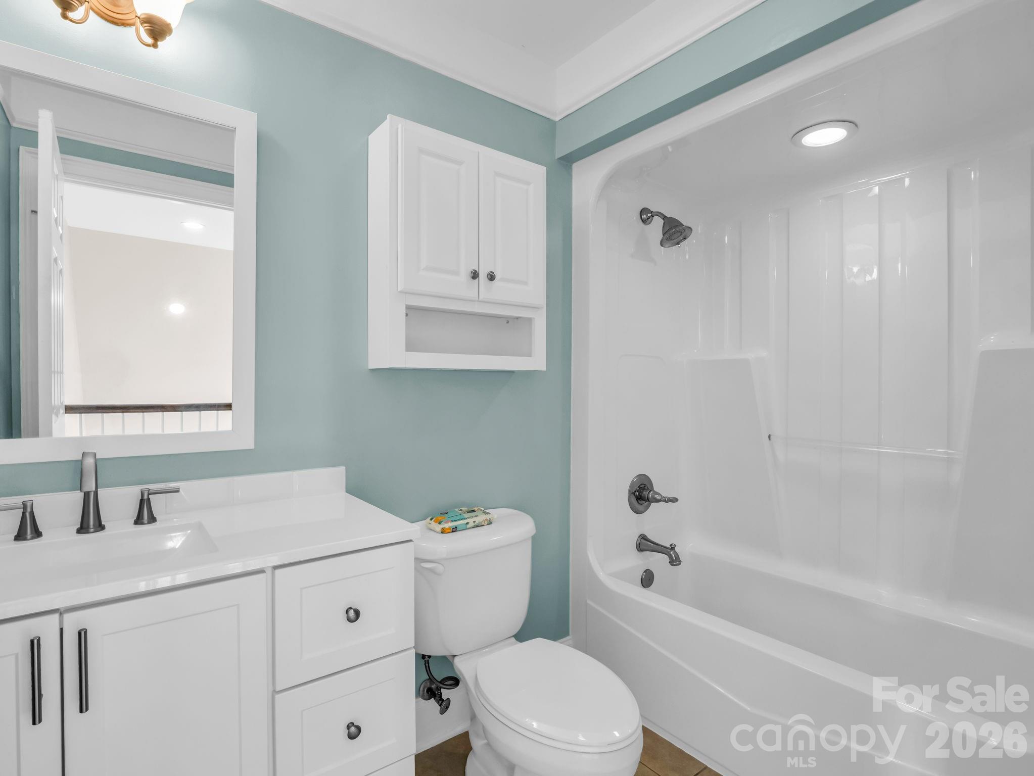 139 North Woodfin Ridge Drive Inman, SC 29349 - Photo 26 of 48 a bathroom with a sink a toilet and a bathtub