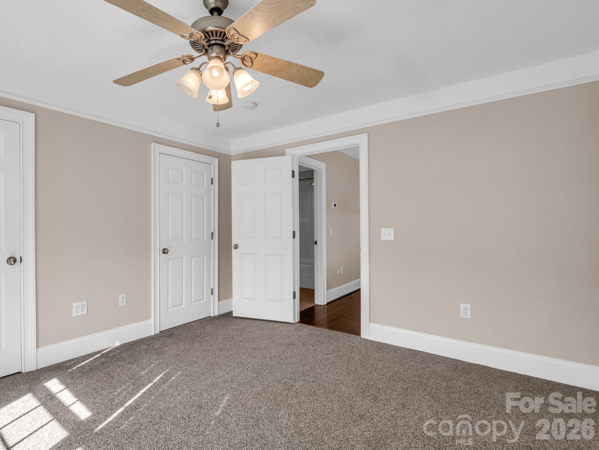 139 North Woodfin Ridge Drive Inman, SC 29349 - Photo 28 of 48 a view of an empty room and chandelier fan