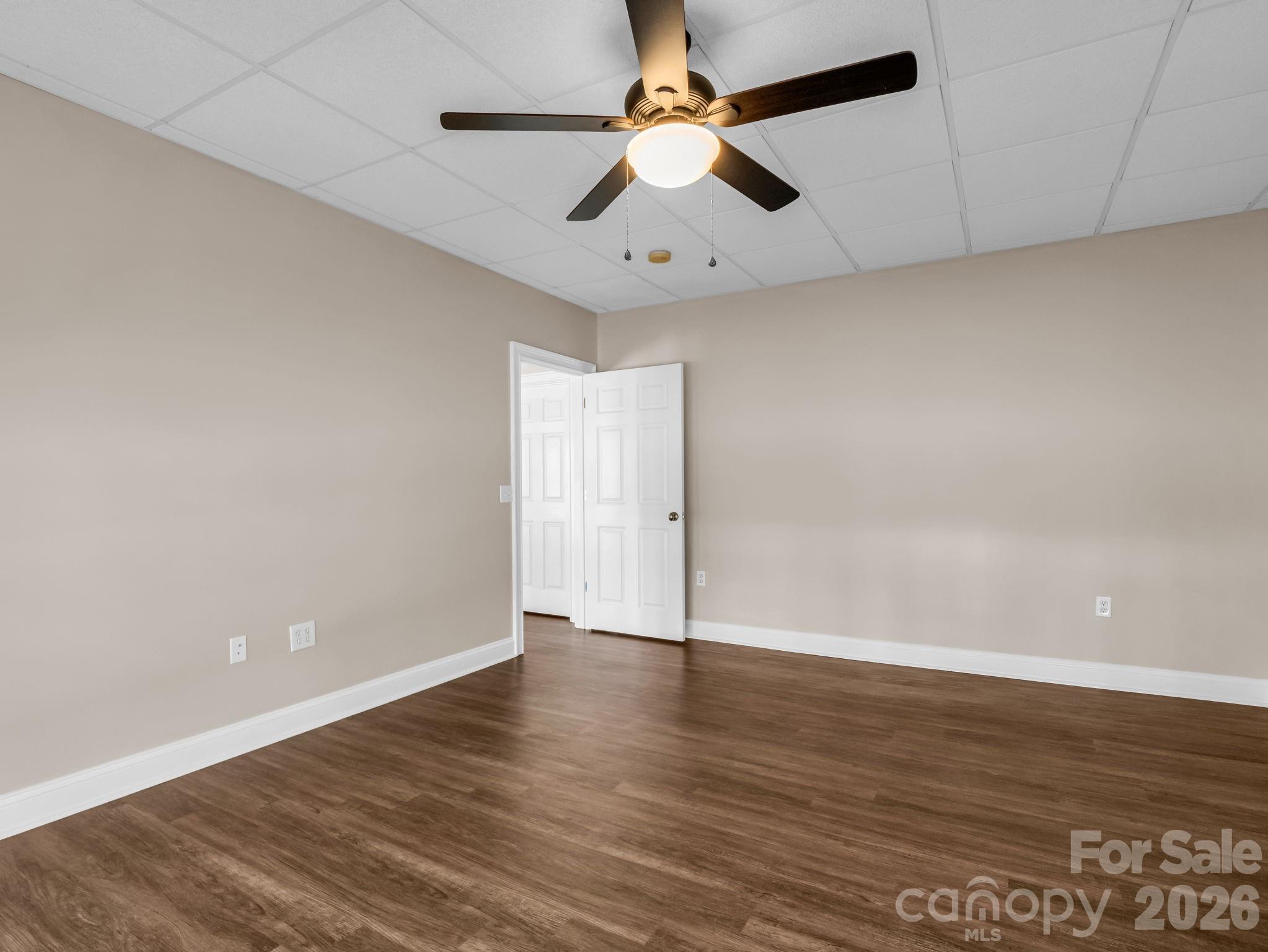 139 North Woodfin Ridge Drive Inman, SC 29349 - Photo 35 of 48 an empty room with wooden floor and windows