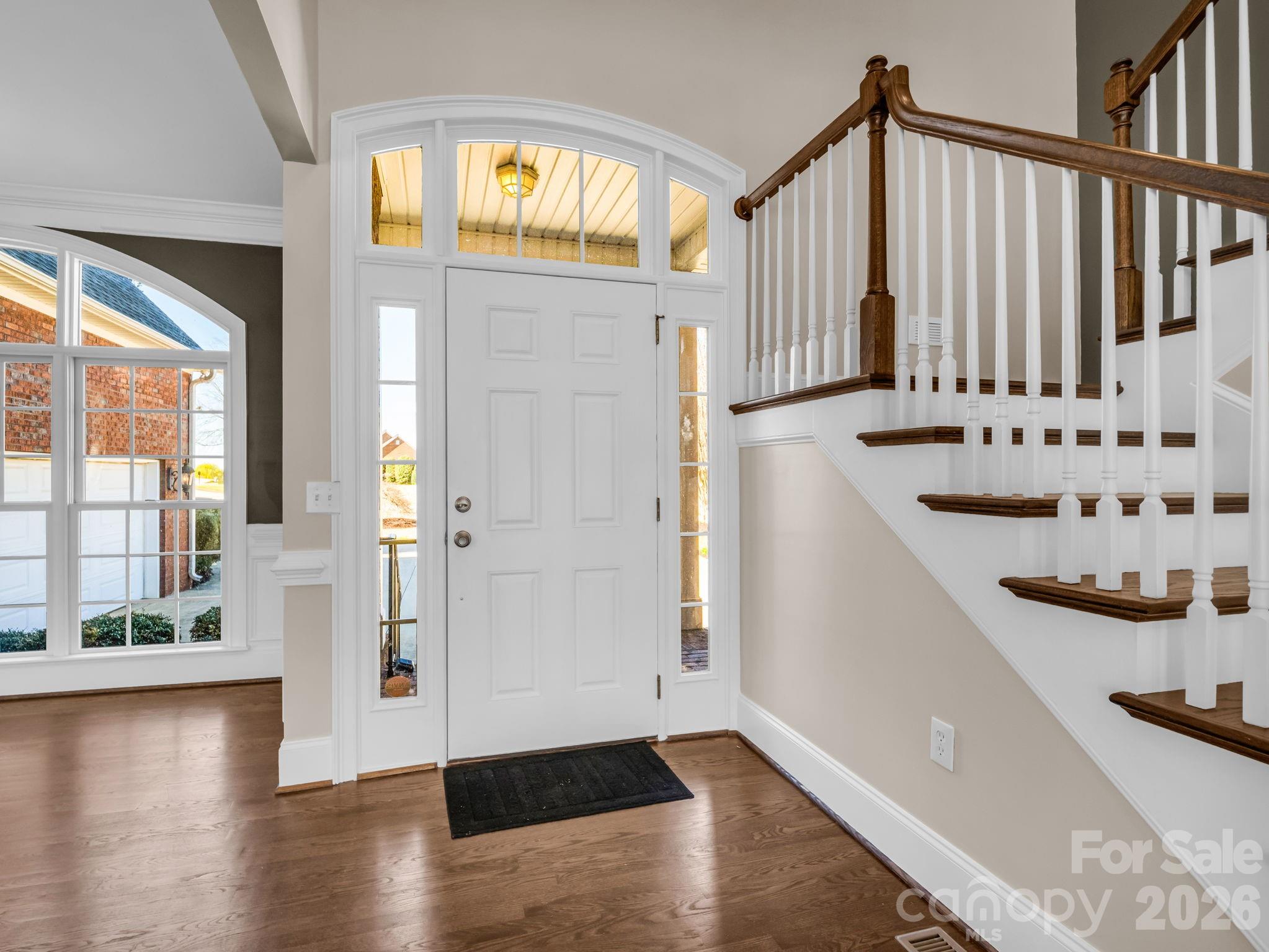 139 North Woodfin Ridge Drive Inman, SC 29349 - Photo 4 of 48 a view of an entryway with wooden floor and door