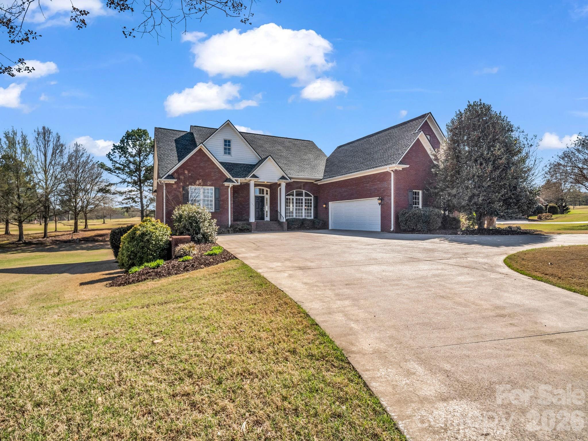 139 North Woodfin Ridge Drive Inman, SC 29349 - Photo 42 of 48 a view of large house with a yard