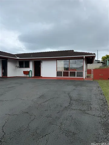 a view of a house with a ofa park