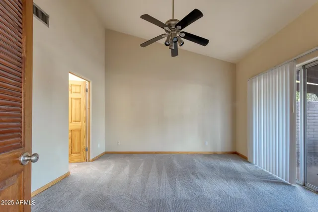 wooden floor and window in an empty room