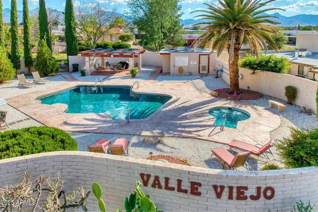 a front view of house with yard and seating area