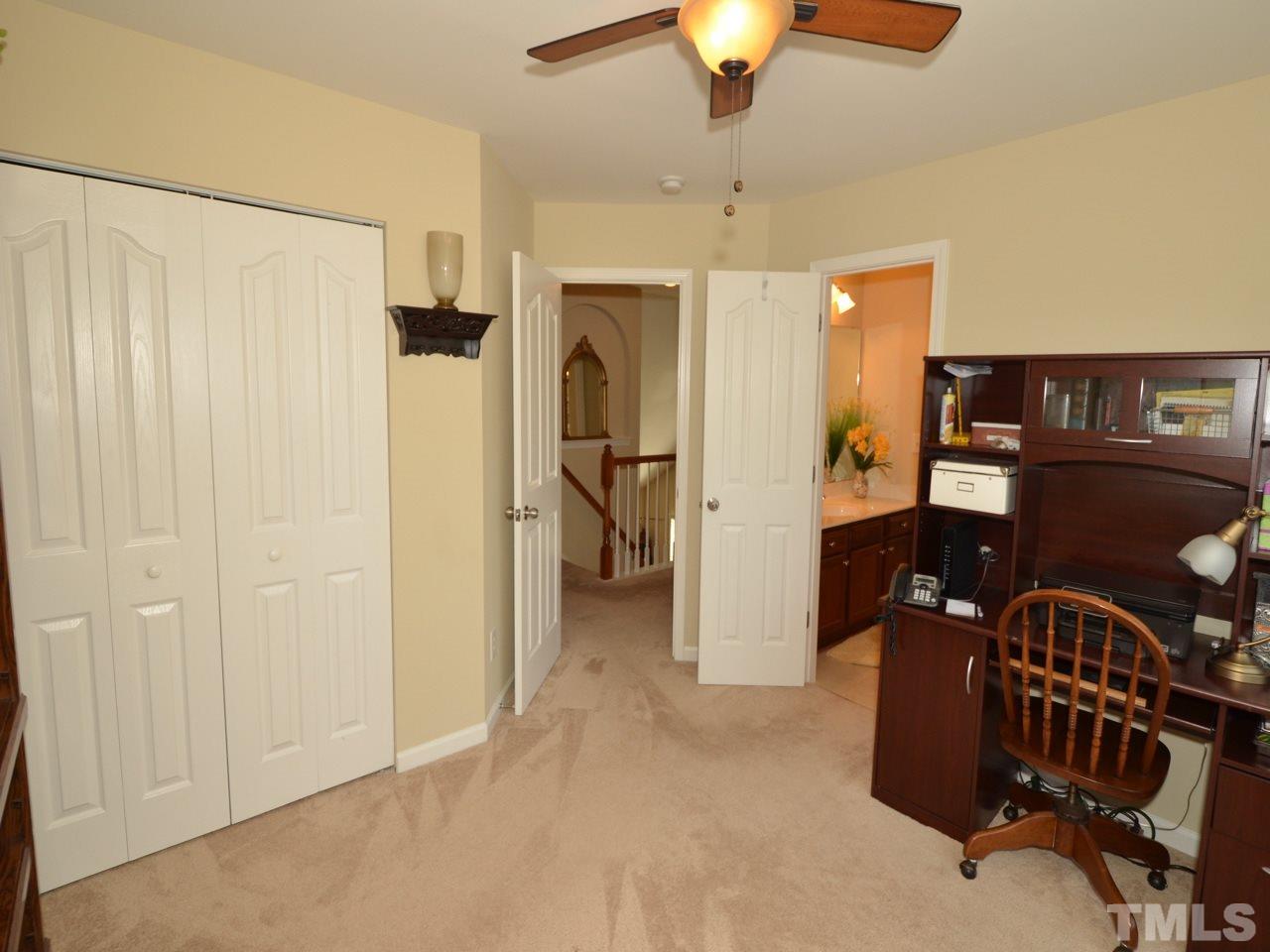 9714 Renfield Drive Raleigh, NC 27617 - Photo 12 of 25 wooden floor and windows in a room