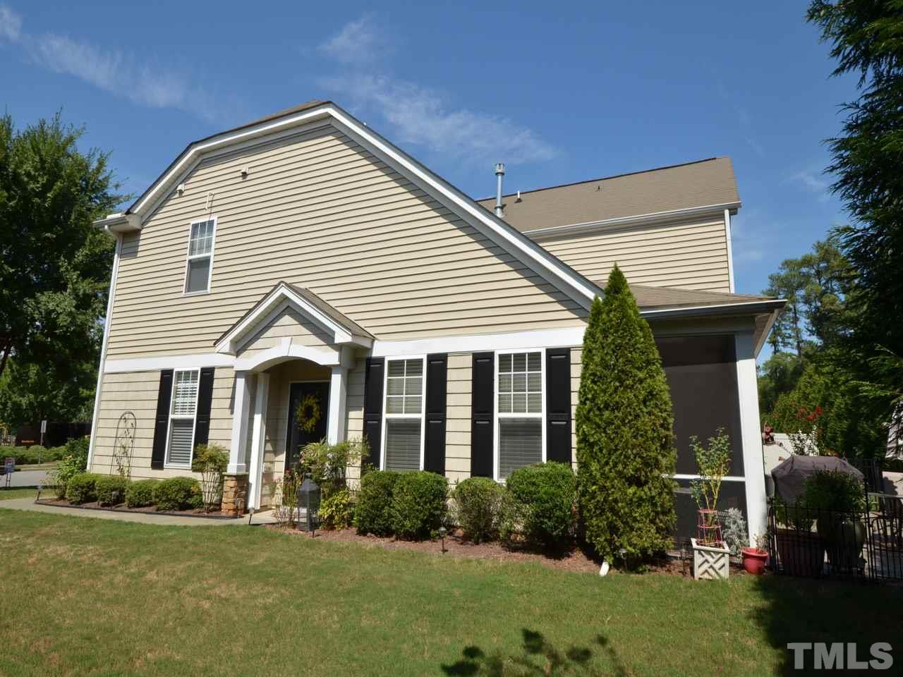 9714 Renfield Drive Raleigh, NC 27617 - Photo 3 of 25 a front view of a house with a yard