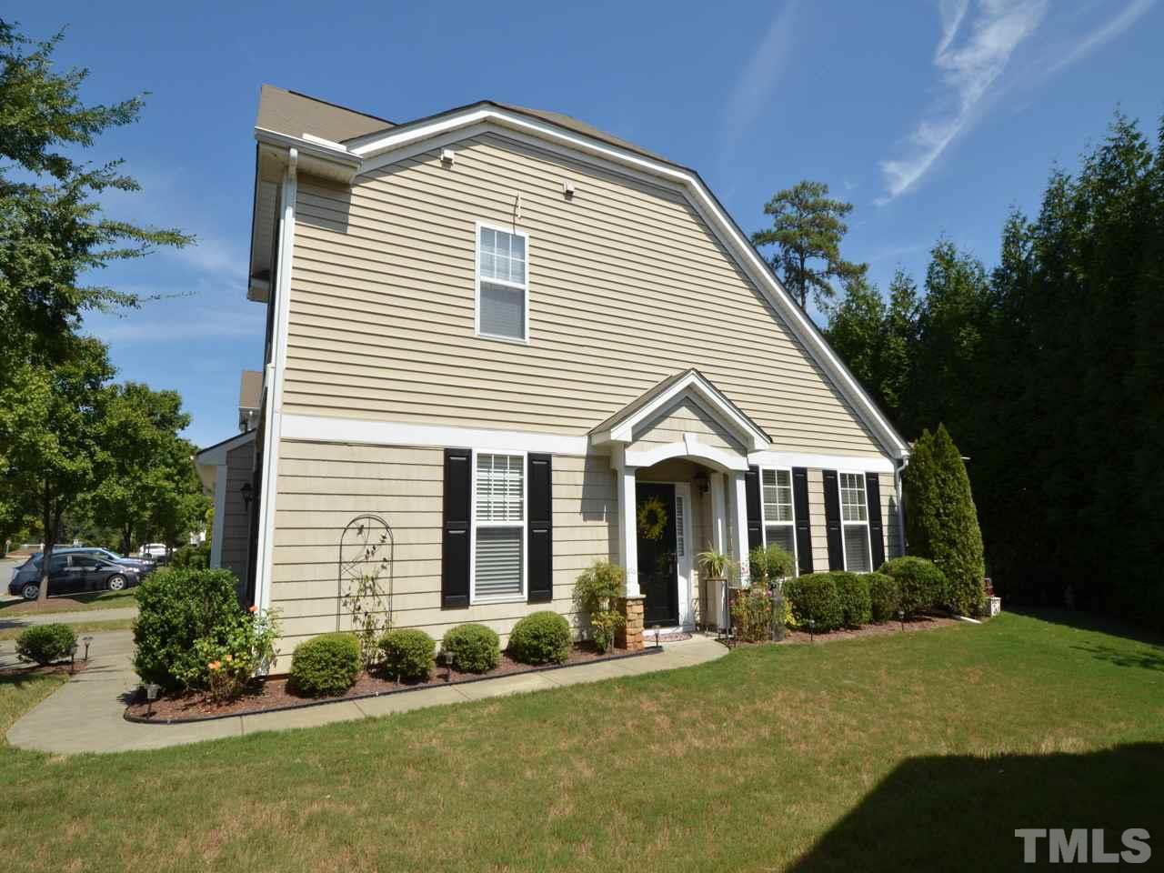 9714 Renfield Drive Raleigh, NC 27617 - Photo 25 of 25 a front view of a house with a yard