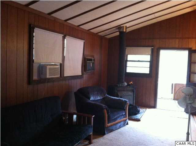 2188 Middle River Road Stanardsville, VA 22973 - Photo 3 of 13 a bedroom with furniture and a window