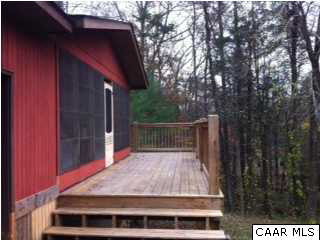 2188 Middle River Road Stanardsville, VA 22973 - Photo 10 of 13 a balcony with trees in front of it