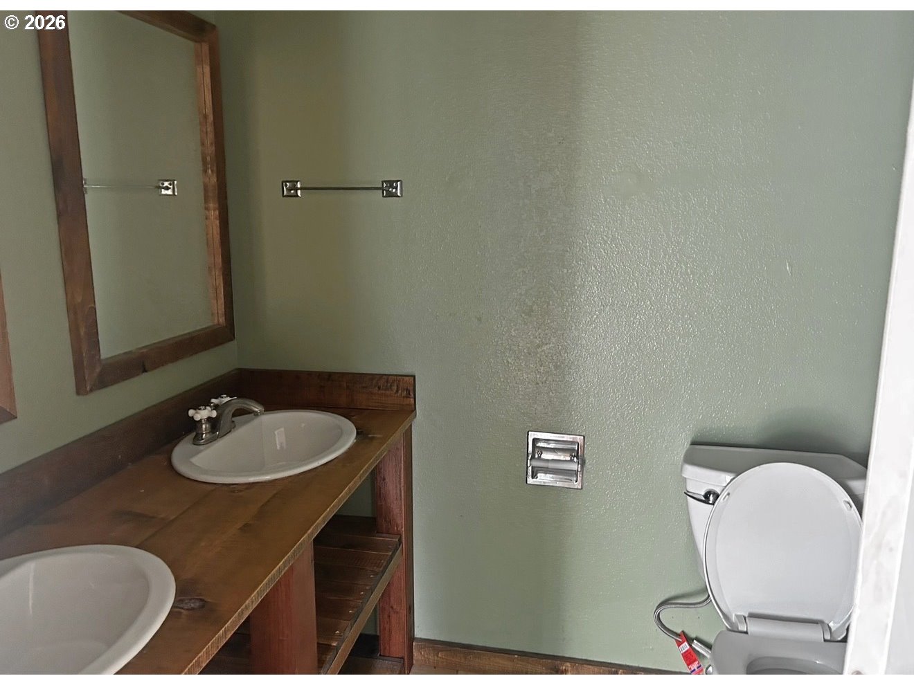 28218 Mateer Road Gold Beach, OR 97444 - Photo 18 of 20 a bathroom with a sink and a mirror