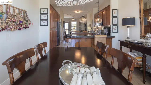 a kitchen with stainless steel appliances granite countertop a sink stove and microwave