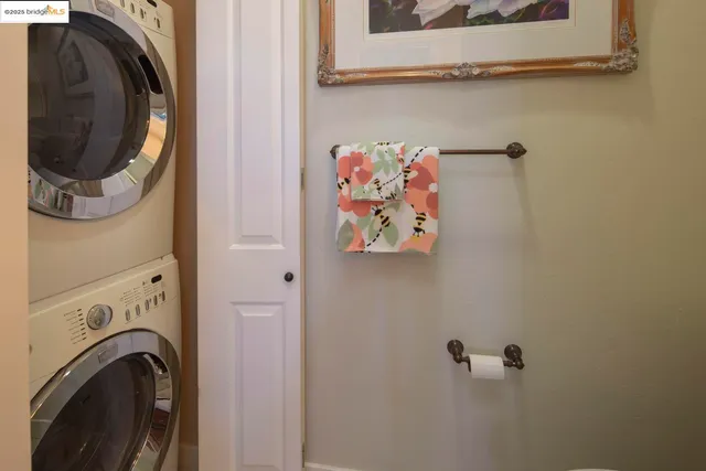 a bedroom with a bed and a desk