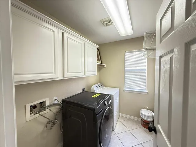 a storage room with washer and dryer