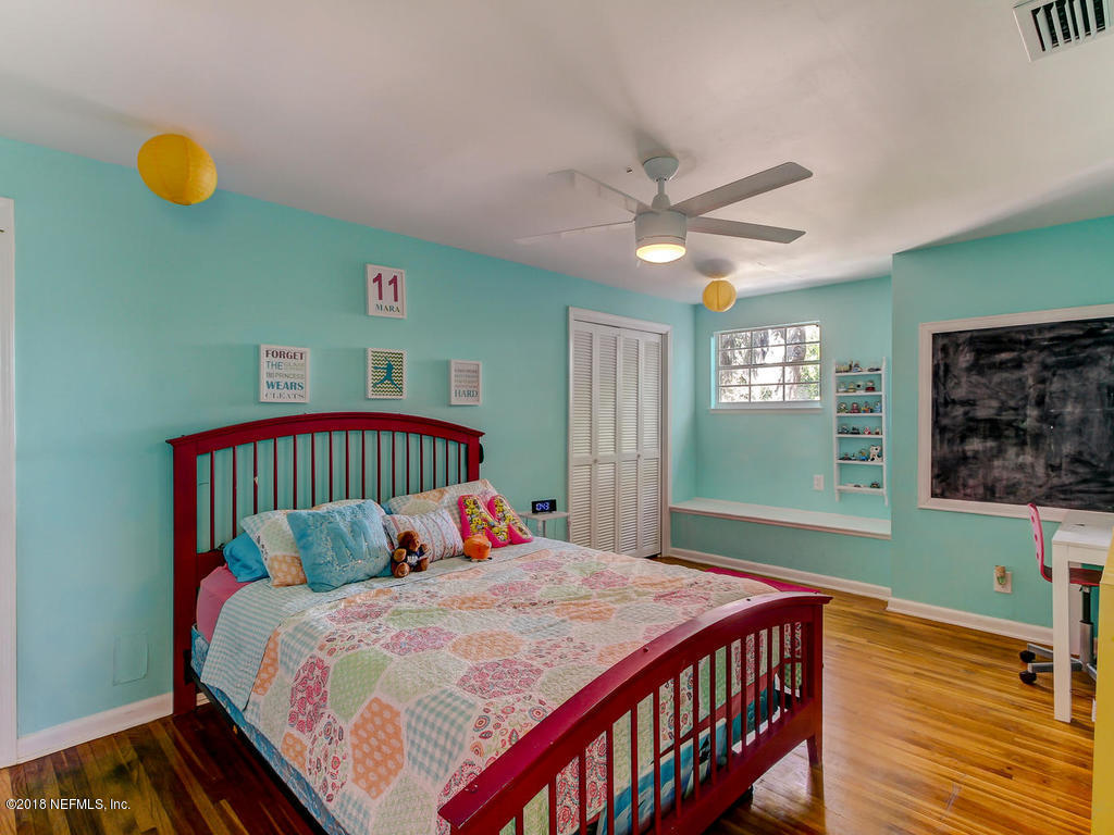 1041 Glen Echo Road Jacksonville, FL 32211 - Photo 27 of 40 a bedroom with a bed and a window