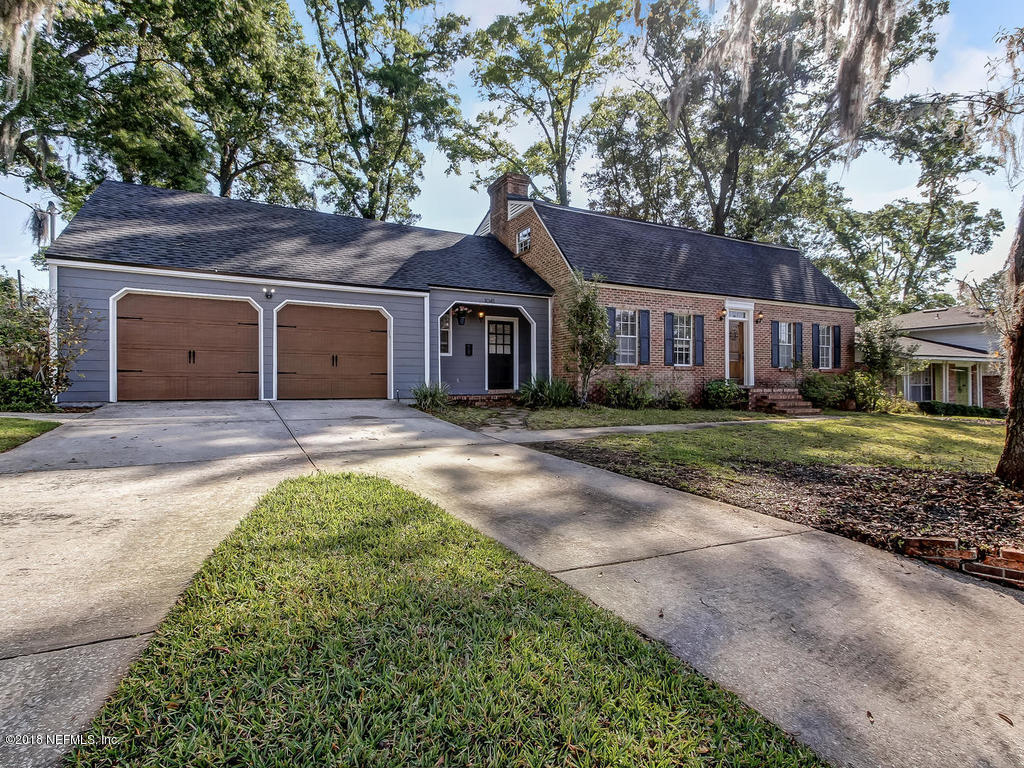 1041 Glen Echo Road Jacksonville, FL 32211 - Photo 3 of 40 front view of a house with a garden