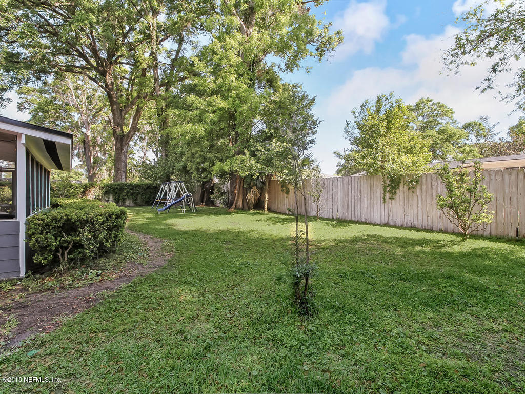 1041 Glen Echo Road Jacksonville, FL 32211 - Photo 40 of 40 a view of a backyard with a tree