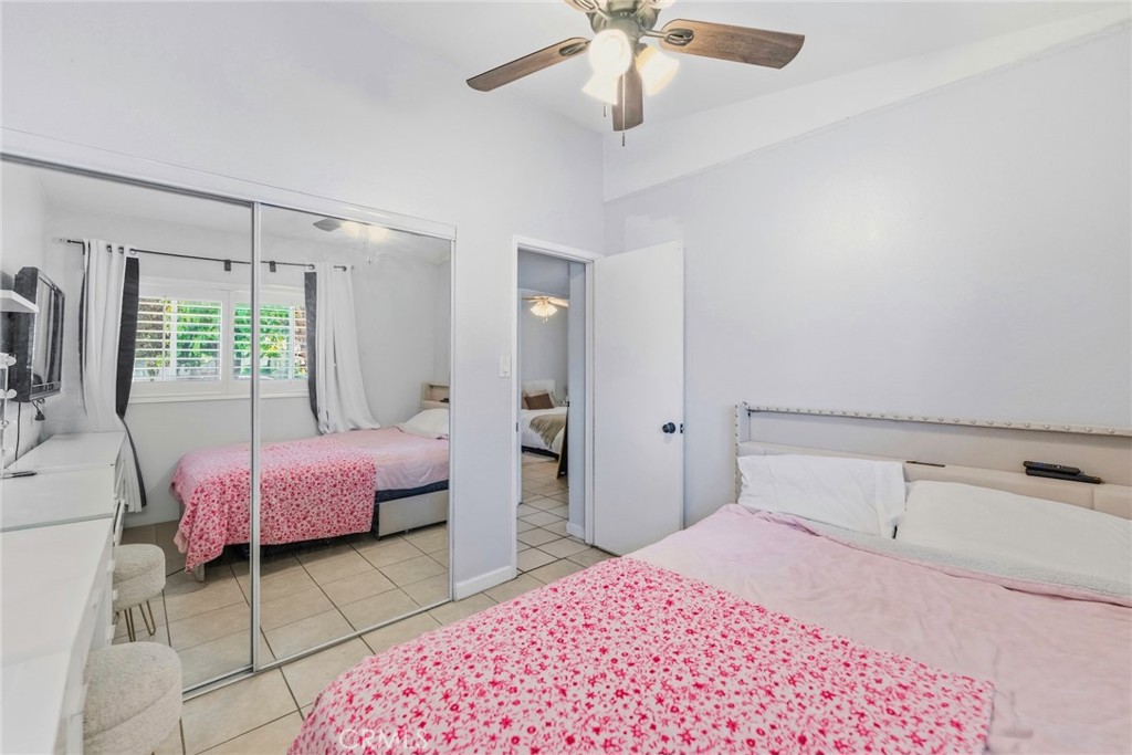 10363 Wagner Way Riverside, CA 92505 - Photo 11 of 26 a bedroom with a bed and a window