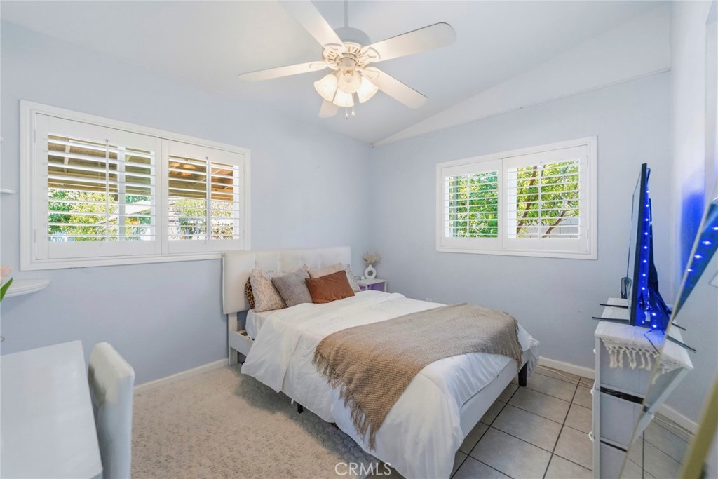 10363 Wagner Way Riverside, CA 92505 - Photo 12 of 26 a bedroom with a bed and a window