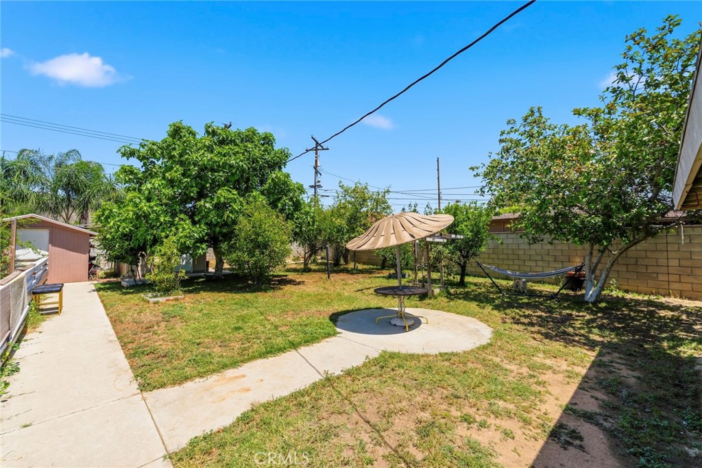 10363 Wagner Way Riverside, CA 92505 - Photo 15 of 26 a view of a swimming pool with a patio and plants