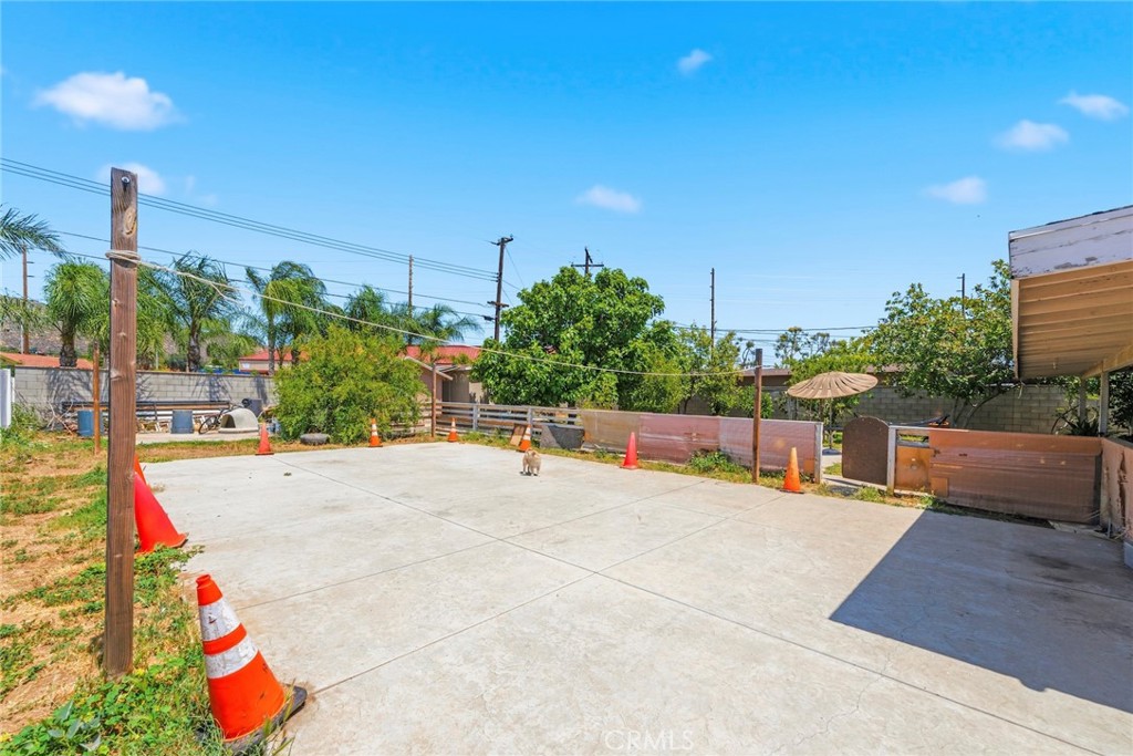 10363 Wagner Way Riverside, CA 92505 - Photo 16 of 26 a view of a swimming pool with an outdoor seating