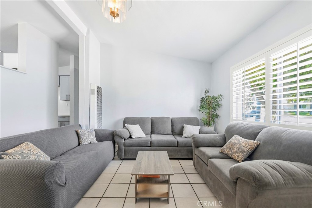 10363 Wagner Way Riverside, CA 92505 - Photo 6 of 26 a living room with furniture and a large window
