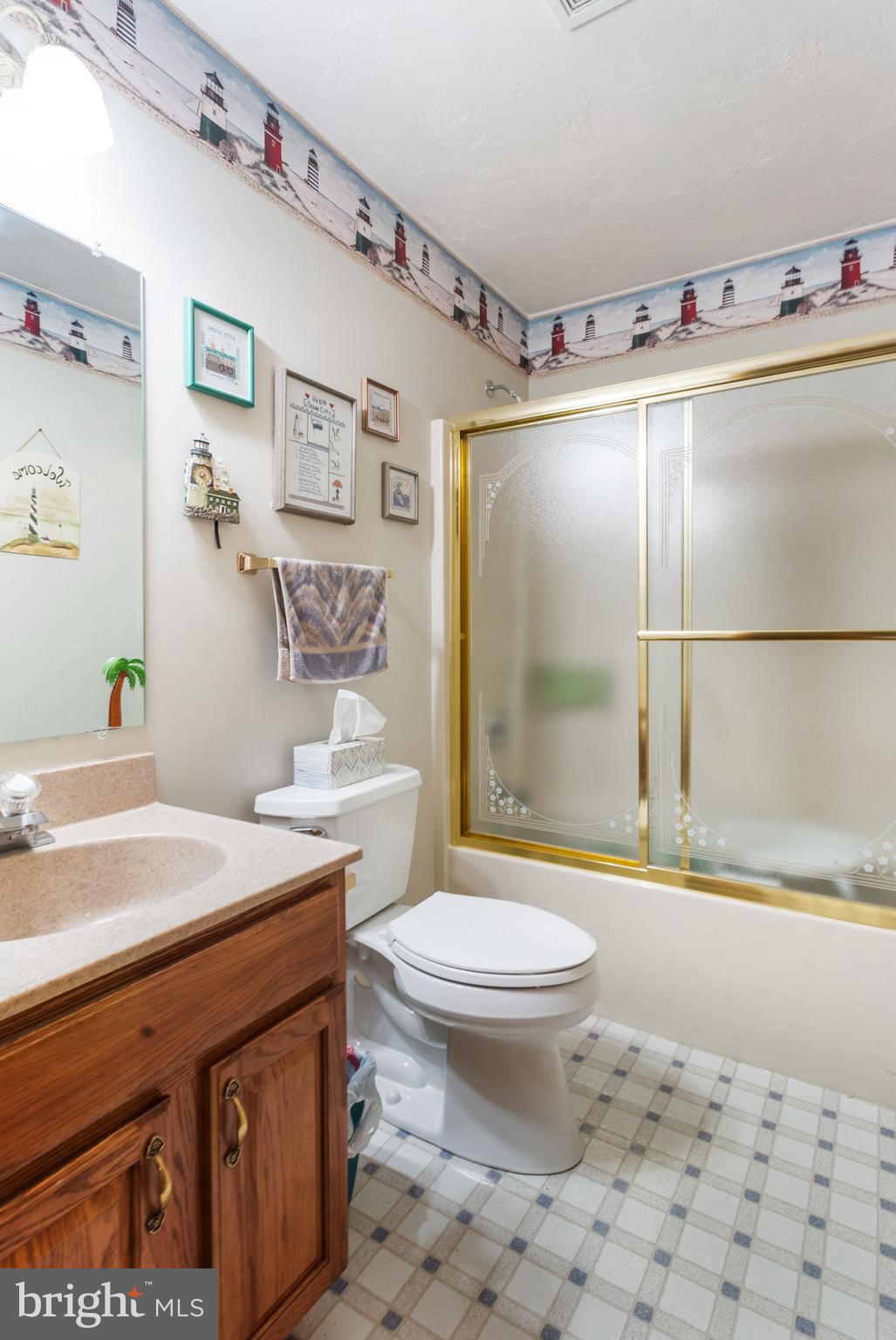 357 Lake Road Spring Grove, PA 17362 - Photo 29 of 35 a bathroom with a sink toilet and shower