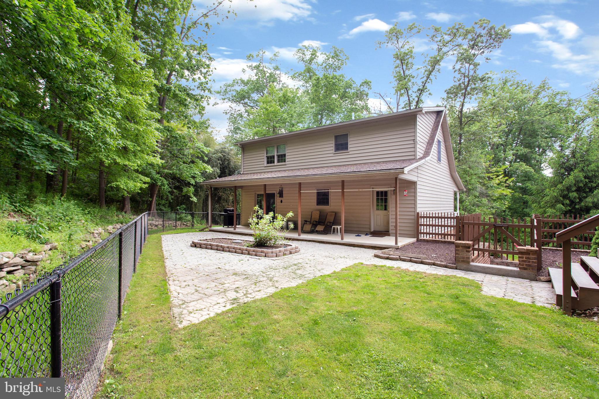 357 Lake Road Spring Grove, PA 17362 - Photo 6 of 35 a view of a house with backyard and sitting area