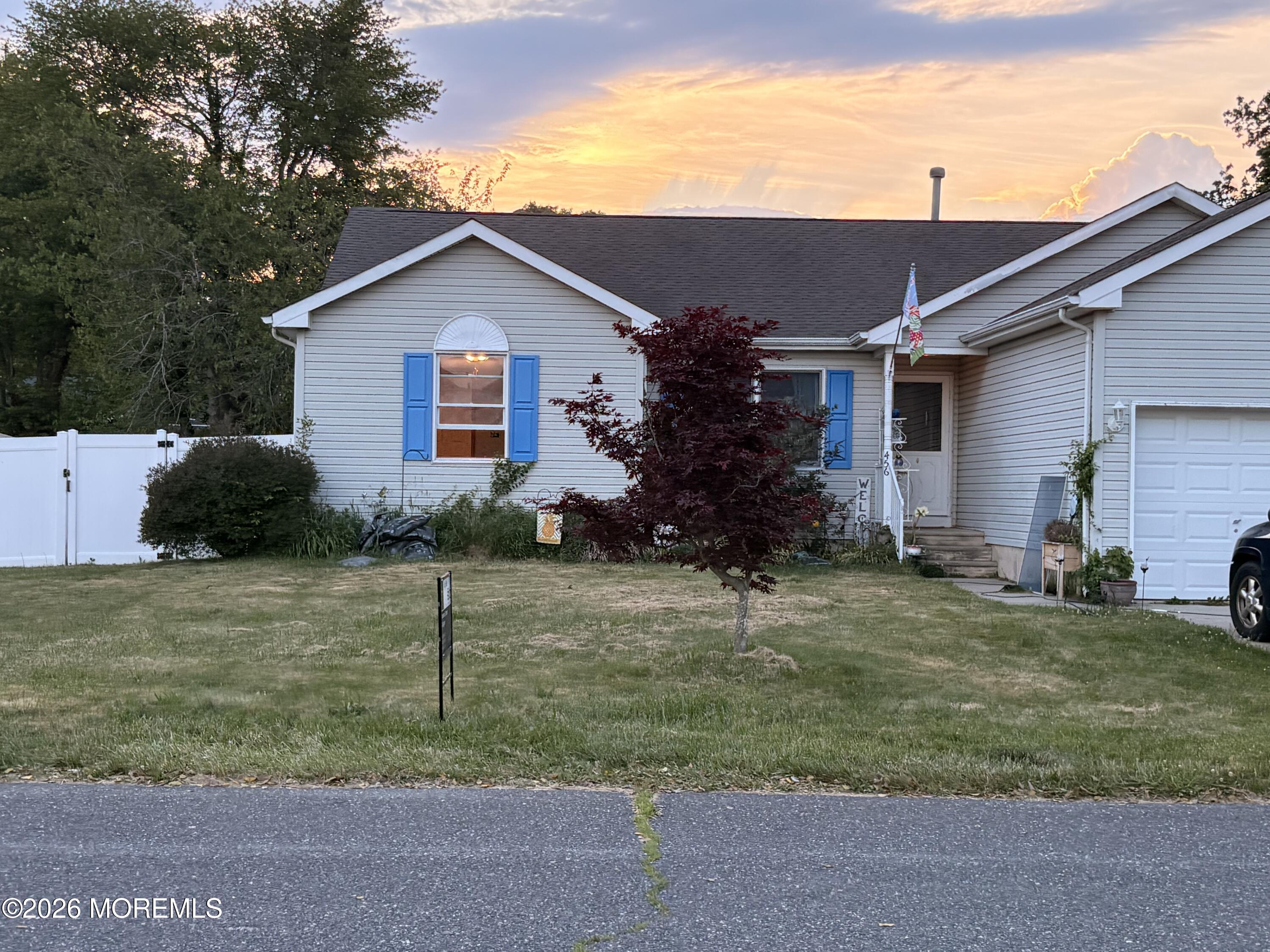 456 Dock Road Forked River, NJ 08731 - Photo 2 of 14 a view of a house with backyard and garden