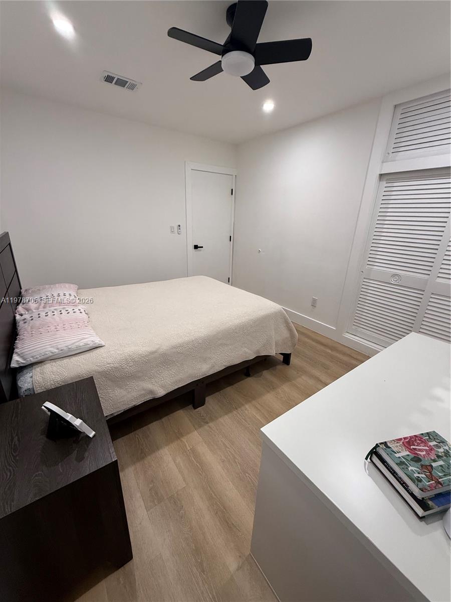 15915 Southwest 103rd Place Miami, FL 33157 - Photo 12 of 17 a bedroom with bed and window