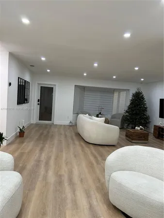 a bedroom with furniture and a couch