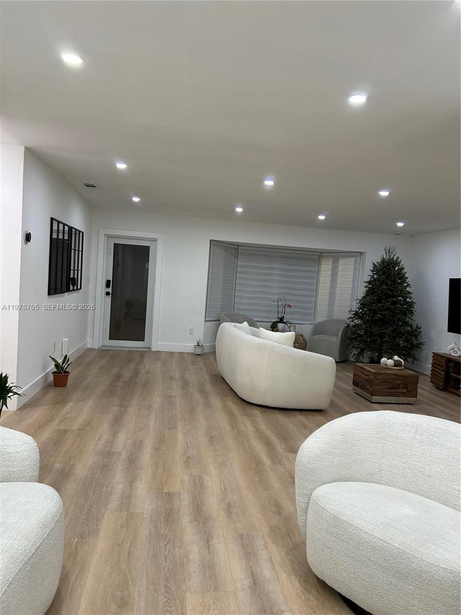 15915 Southwest 103rd Place Miami, FL 33157 - Photo 3 of 17 a bedroom with furniture and a couch