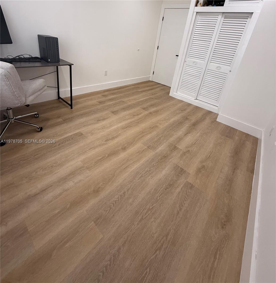 15915 Southwest 103rd Place Miami, FL 33157 - Photo 8 of 17 a view of a workspace