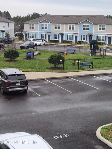 a car parked in front of a house