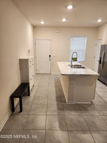 a view of a kitchen with a sink