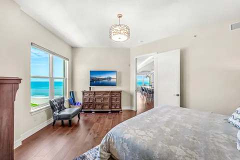 a bathroom with a tub and shower