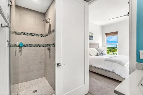 a living room with furniture a couch and a window