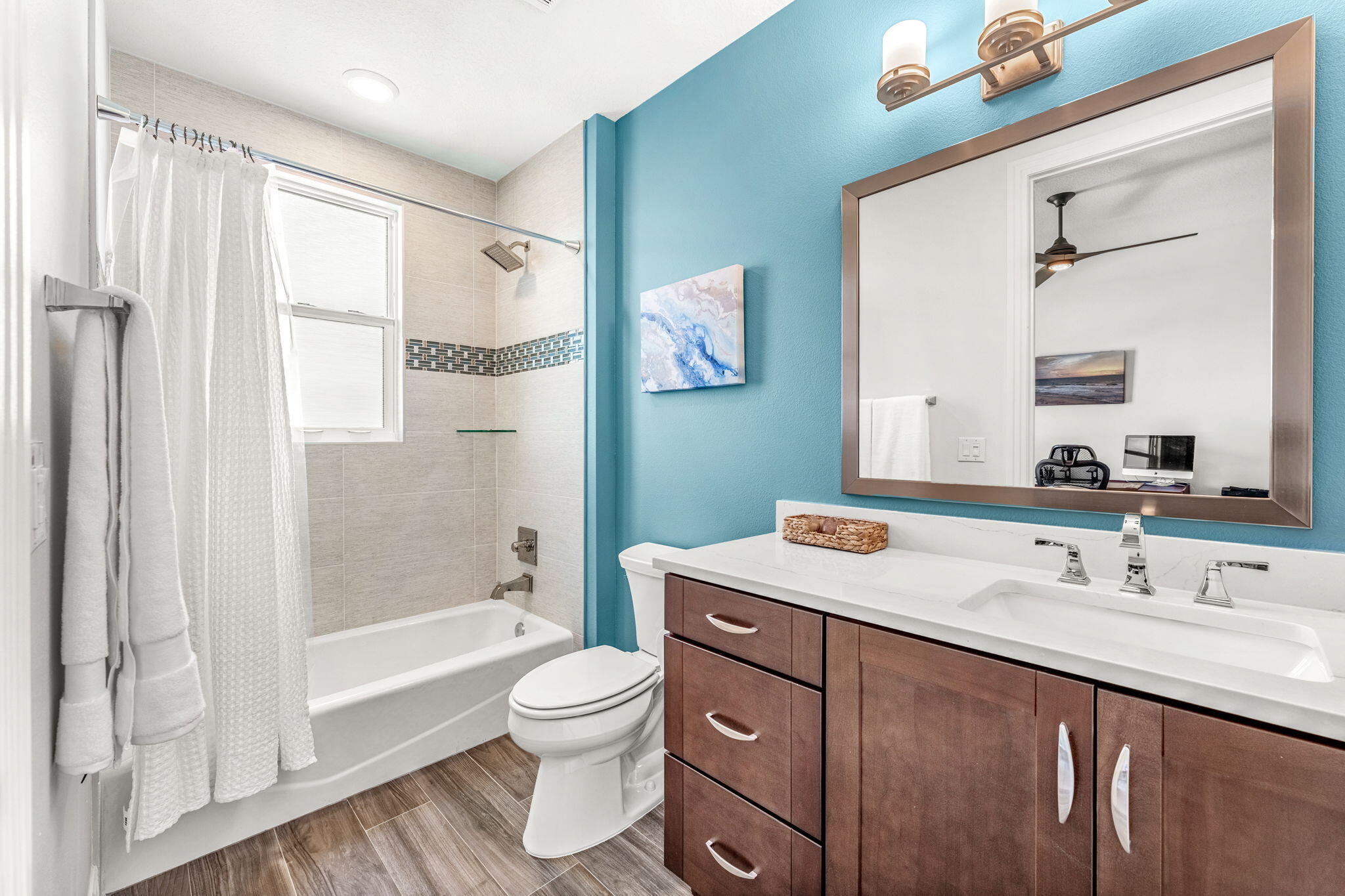 1725 North Hwy A1A, Unit 401 Indialantic, FL 32903 - Photo 21 of 39 a bathroom with a sink toilet and shower