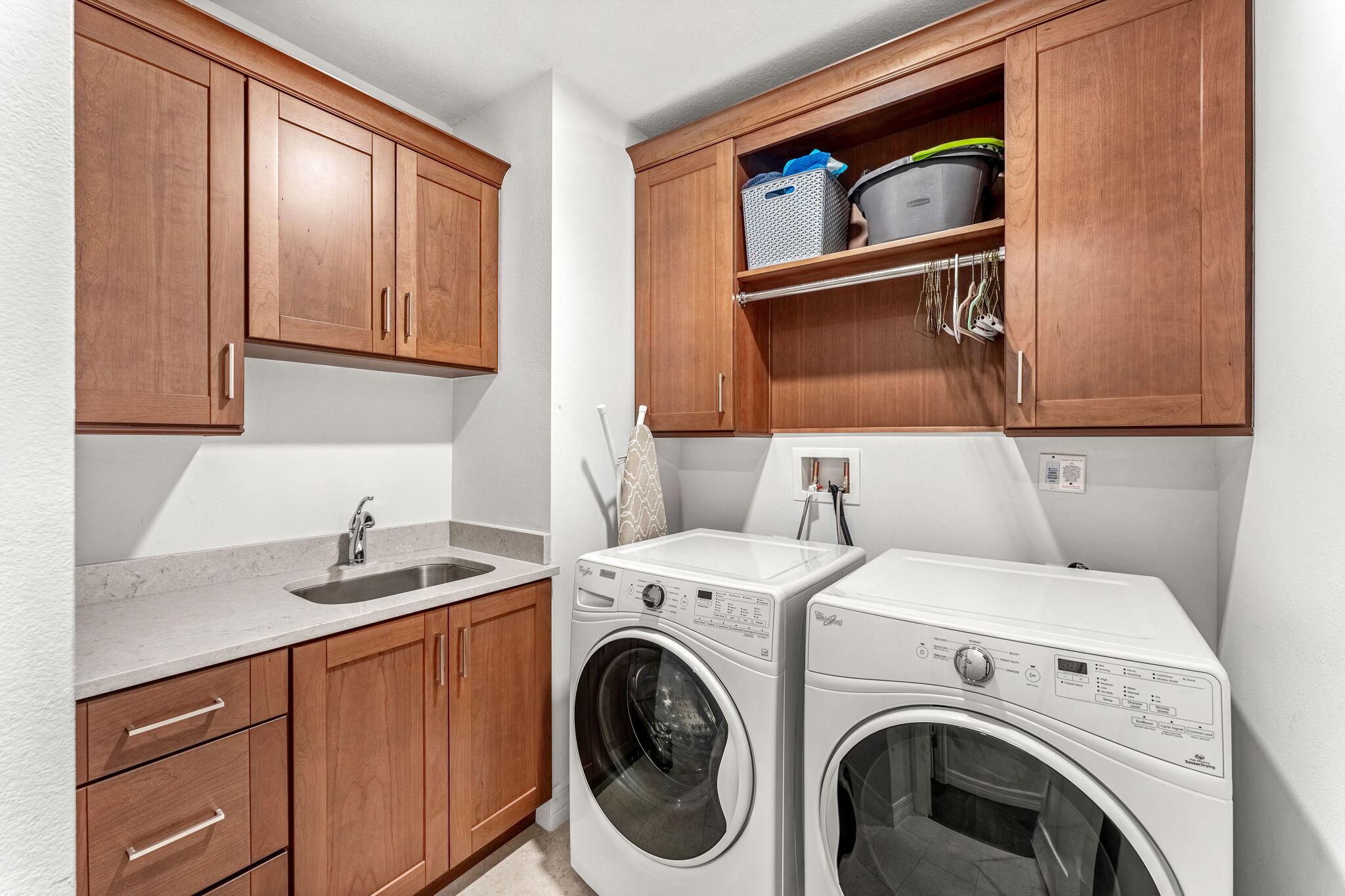 1725 North Hwy A1A, Unit 401 Indialantic, FL 32903 - Photo 22 of 39 a utility room with dryer and washer