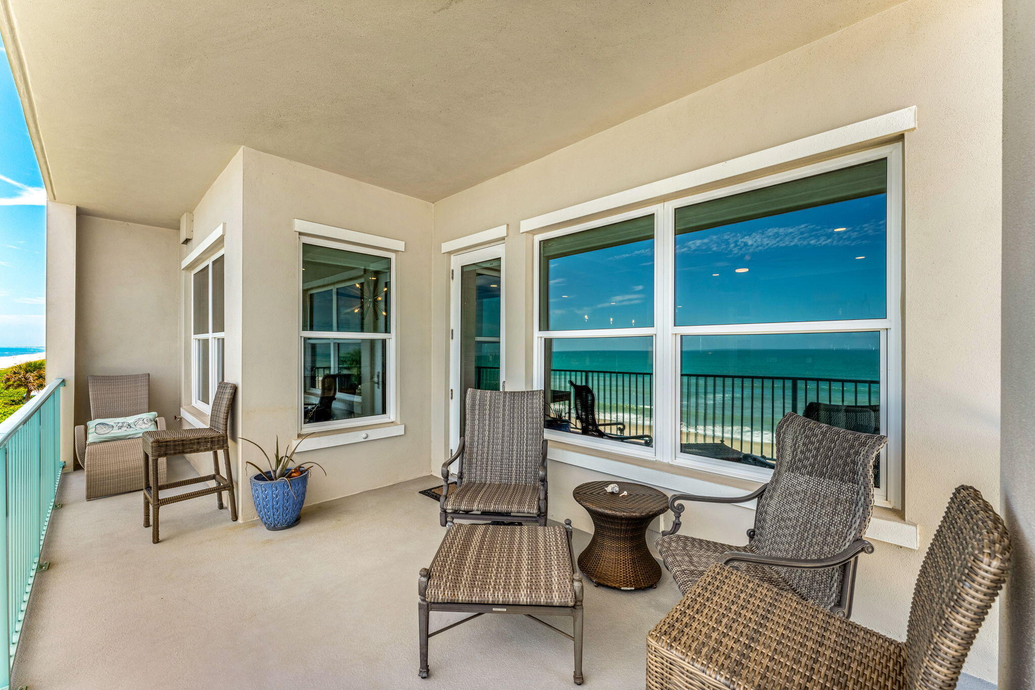 1725 North Hwy A1A, Unit 401 Indialantic, FL 32903 - Photo 27 of 39 a living room with furniture and a window