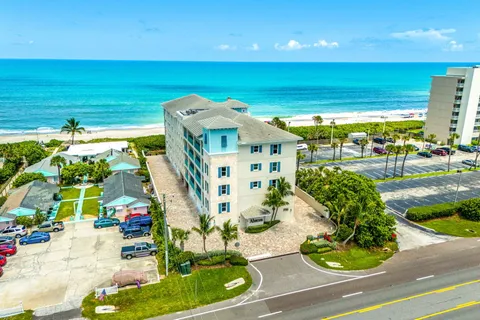 a view of a street with an ocean view