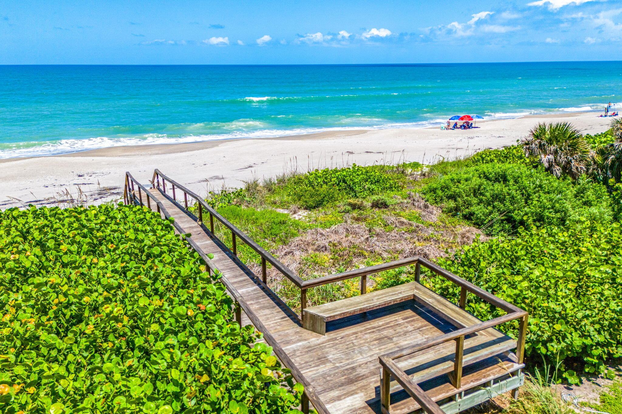 1725 North Hwy A1A, Unit 401 Indialantic, FL 32903 - Photo 32 of 39 a view of a backyard with an ocean