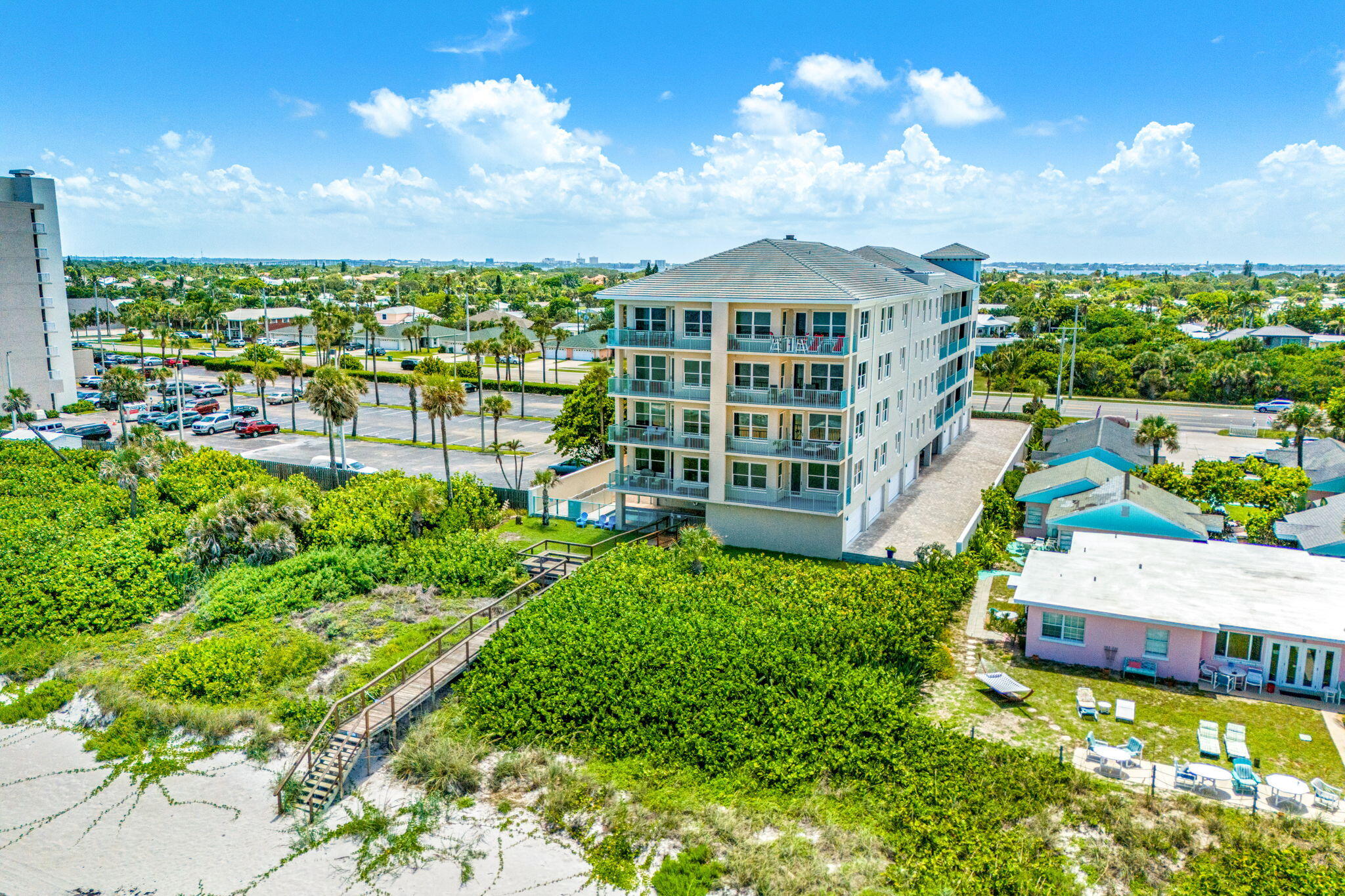 1725 North Hwy A1A, Unit 401 Indialantic, FL 32903 - Photo 33 of 39 a view of a city with tall buildings