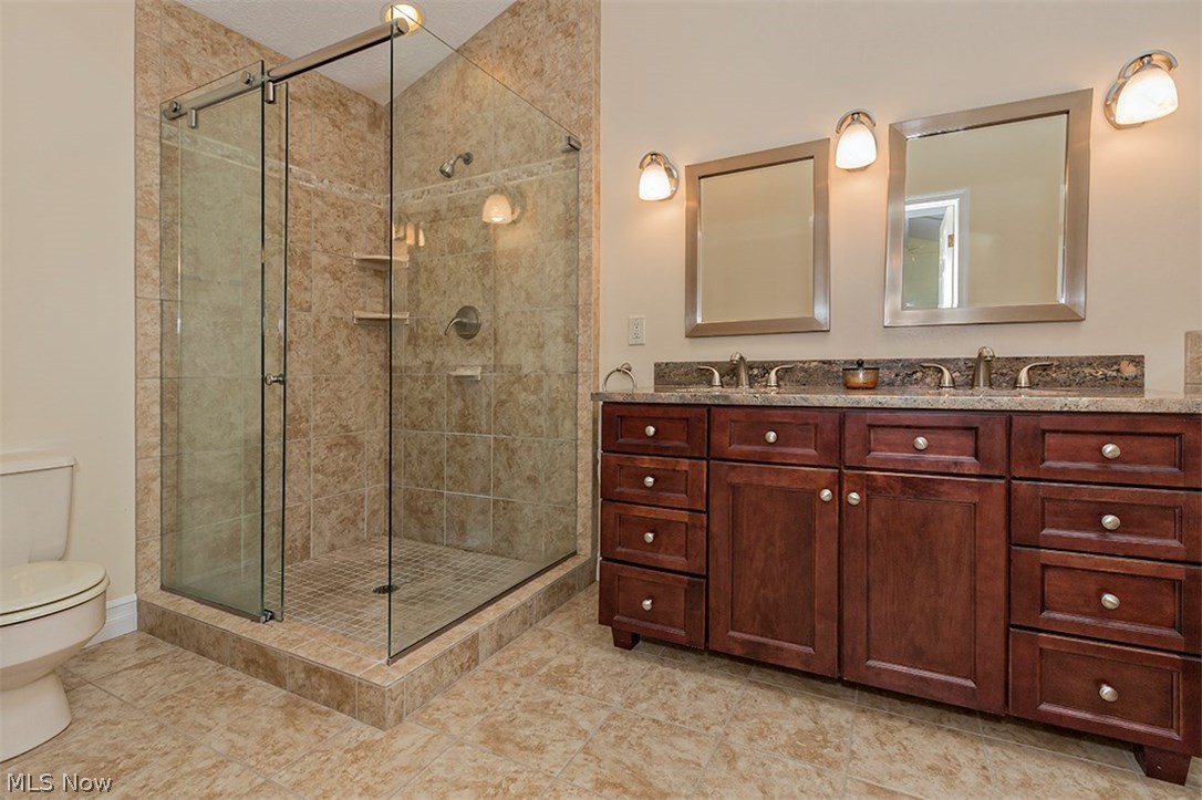 6575 Liberty Road Solon, OH 44139 - Photo 18 of 30 Beautifully updated Master bathroom with double sinks and granite counter tops