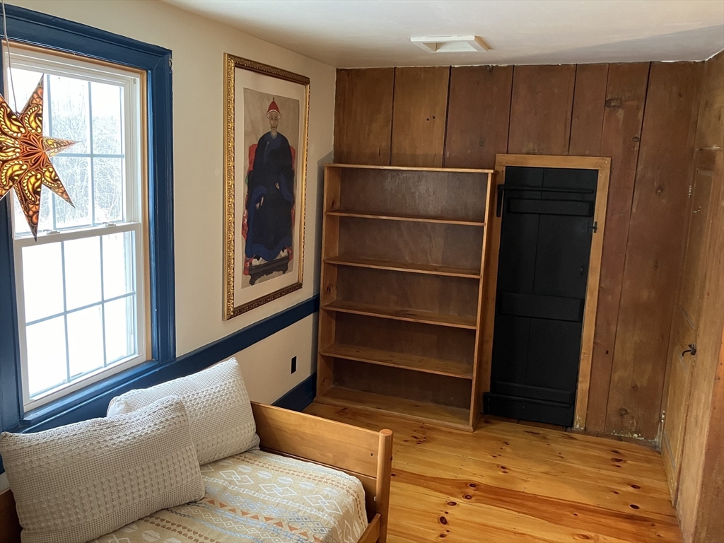 103 East Hawley Road Hawley, MA 01339 - Photo 11 of 34 a living room with furniture and a window