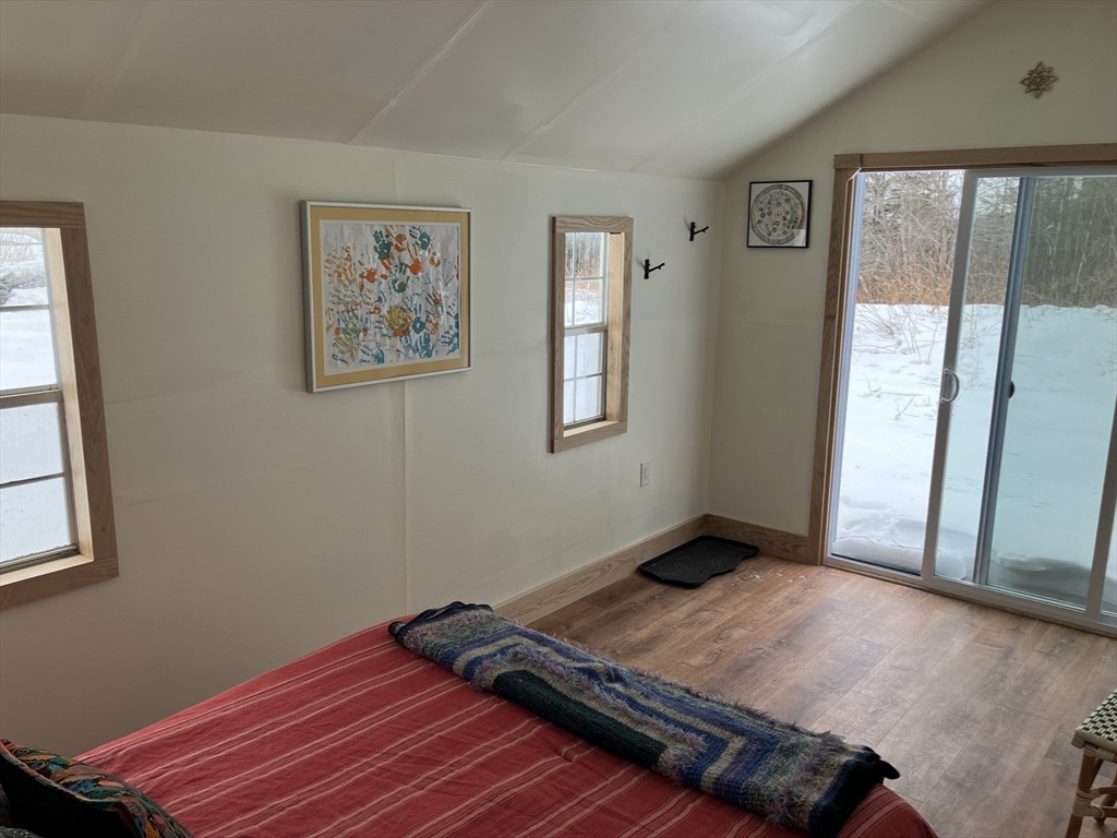103 East Hawley Road Hawley, MA 01339 - Photo 26 of 34 a bedroom with a bed and a window